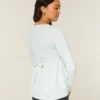 Langermet babydoll-top med grafisk mønster og klembust