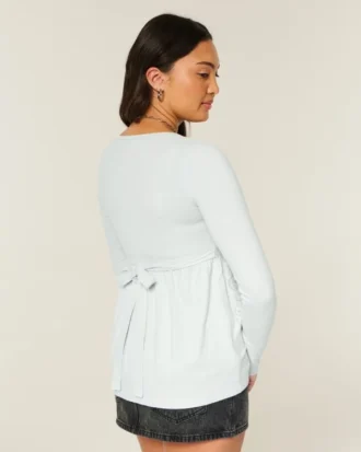 Langermet babydoll-top med grafisk mønster og klembust