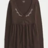 Langermet babydoll-top med klembust