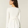 Langermet babydoll-top med klembust