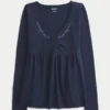 Langermet babydoll-top med klembust