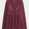 Langermet babydoll-top med klembust