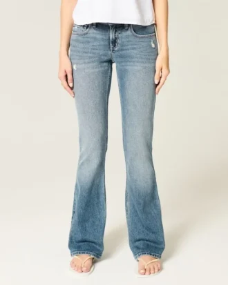 Lav midje, slitt, medium vasket bootcut-jeans