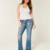 Lavmidje, rippede bootcut-jeans i medium vask