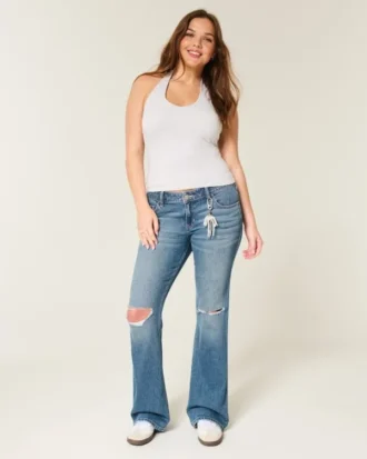 Lavmidje, rippede bootcut-jeans i medium vask