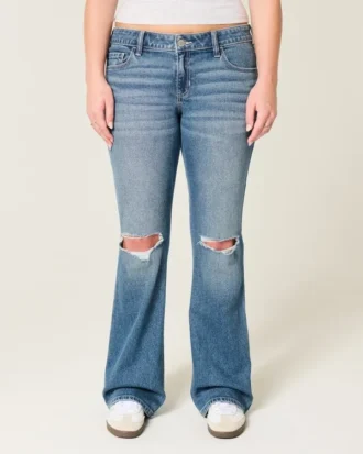 Lavmidje, rippede bootcut-jeans i medium vask