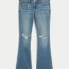 Lavmidje, rippede bootcut-jeans i medium vask