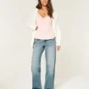 Lavt sittende baggy jeans i medium vask