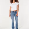 Lavt sittende bootcut-jeans i medium vask