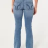 Lavt sittende bootcut-jeans i medium vask