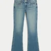 Lavt sittende bootcut-jeans med medium vask og nitter