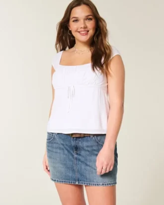 Lavt sittende brodert denim miniskjørt