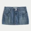 Lavt sittende brodert denim miniskjørt
