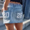 Lavt sittende Class of ’26 denim miniskjørt