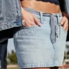 Lavt sittende Class of ’26 denim miniskjørt