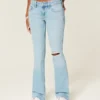 Lavt sittende, lettvasket bootcut-jeans med broderi og rift