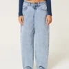 Lavt sittende, lysvasket, koniske baggy jeans