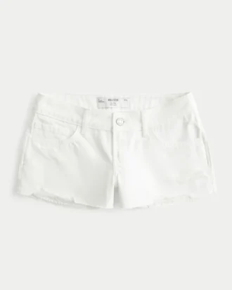 Lavt sittende mini-shorts i hvit denim med slitt look
