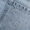Lavt sittende miniskjørt i denim med brodert stjerne