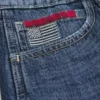 Lavt sittende, mørkvasket baggy jort med amerikansk flagg