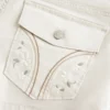 Lavt sittende poplin-shorts med blomstermønster på baklommen