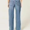 Lavt sittende, slitte jeans i medium vask