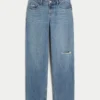 Lavt sittende, slitte jeans i medium vask