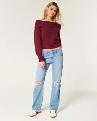Lavt sittende, slitte jeans med medium vask og avslappet, rett passform