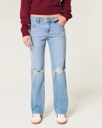 Lavt sittende, slitte jeans med medium vask og avslappet, rett passform