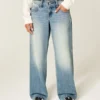 Lavt sittende Y2K-jeans med medium vask og baggy passform