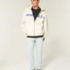 Lysvasket atletisk skinny jeans