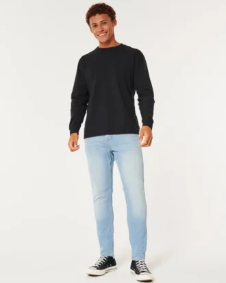 Lysvasket atletisk skinny jeans