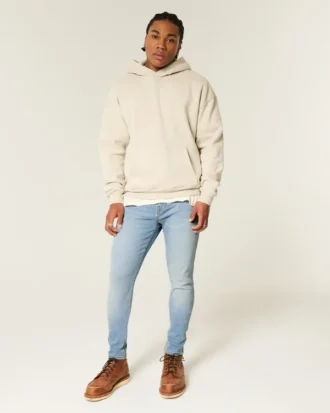 Lysvasket atletisk skinny jeans
