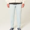 Lysvasket atletisk skinny jeans
