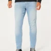Lysvasket atletisk skinny jeans