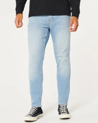 Lysvasket atletisk skinny jeans