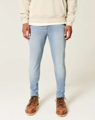 Lysvasket atletisk skinny jeans