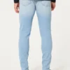 Lysvasket atletisk skinny jeans
