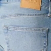 Lysvasket atletisk skinny jeans