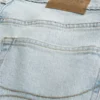 Lysvasket atletisk skinny jeans
