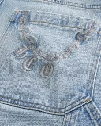 Lysvasket brodert baklomme skater baggy malerjeans
