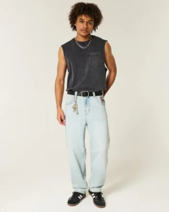Lysvasket skaterjeans med spillkortgrafikk