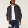 Midt-lår fleece UConn Huskies grafiske shorts