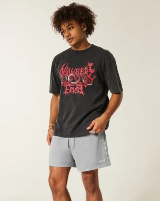 Midt-lårstrikkede fotballshorts med logo