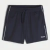 Midt-lårstrikkede fotballshorts med logo