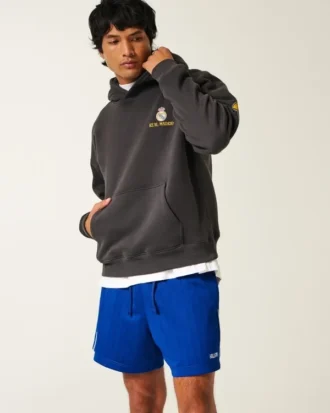 Midt-lårstrikkede fotballshorts med logo