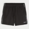 Midt-lårstrikkede fotballshorts med logo