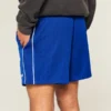 Midt-lårstrikkede fotballshorts med logo