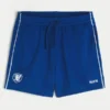 Midt-lårstrikkede fotballshorts med logo