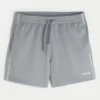 Midt-lårstrikkede fotballshorts med logo